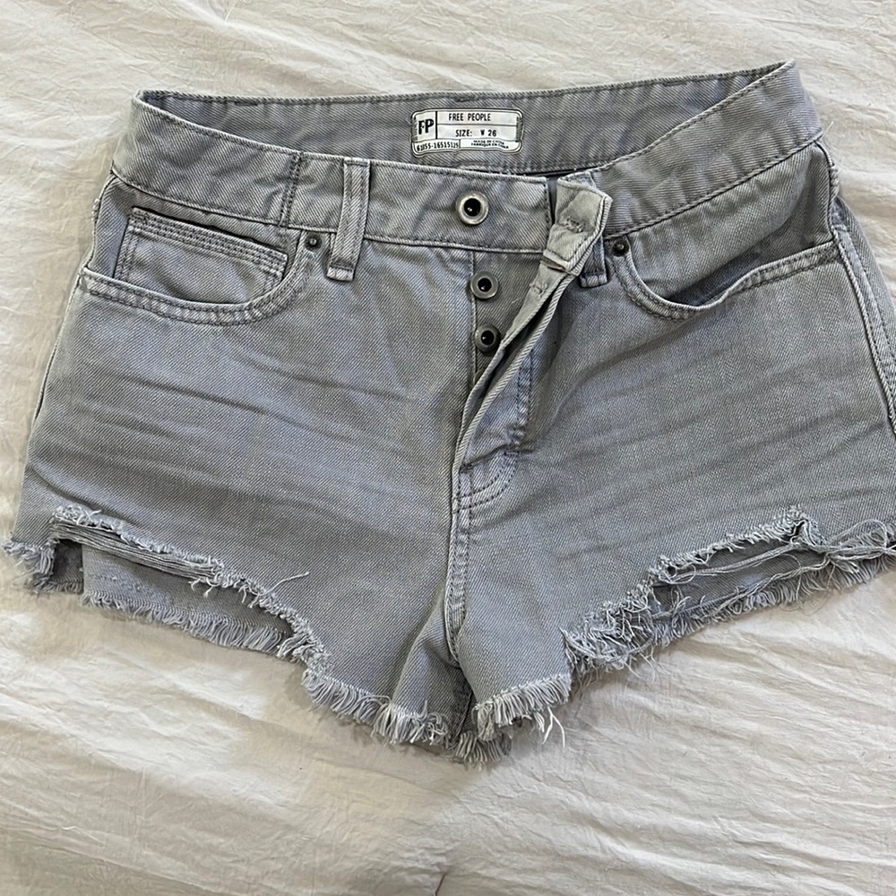 Free people gray jean shorts. Never worn. Size 26